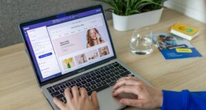 How has e-commerce changed the way businesses operate online? a person typing on a laptop on a table