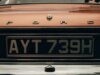 Who Pays When a Private Plate Transfer Goes Wrong on a Company Vehicle? orange and black car plate
