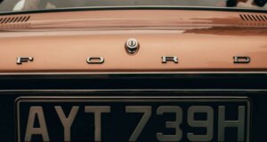 Who Pays When a Private Plate Transfer Goes Wrong on a Company Vehicle? orange and black car plate