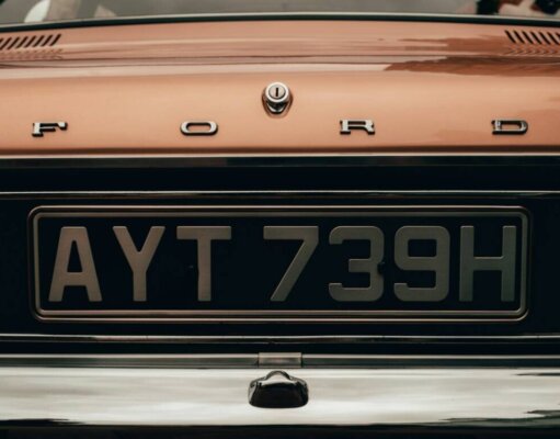 Who Pays When a Private Plate Transfer Goes Wrong on a Company Vehicle? orange and black car plate
